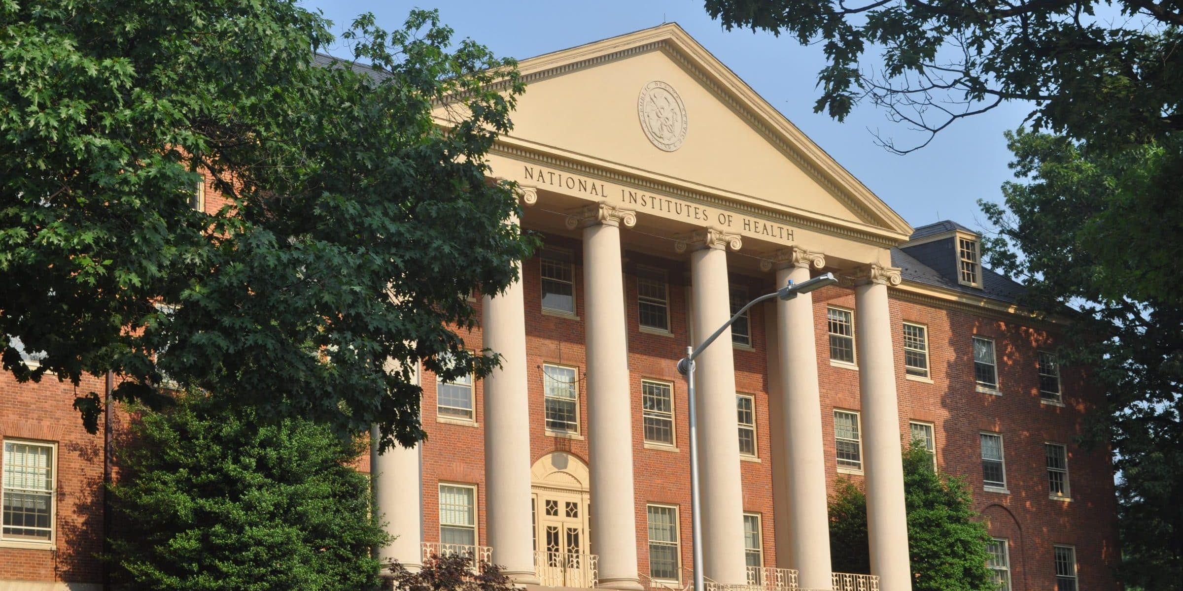 Photo of the main entrance of the National Institutes of Health (NIH) building